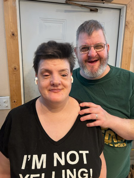 teresa and mike touchup image of the author standing with her husband